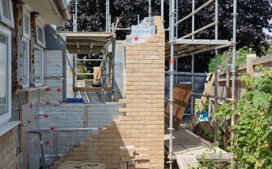 Extension work in progress at the side of a house